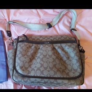 Coach diaper bag with changing pad
